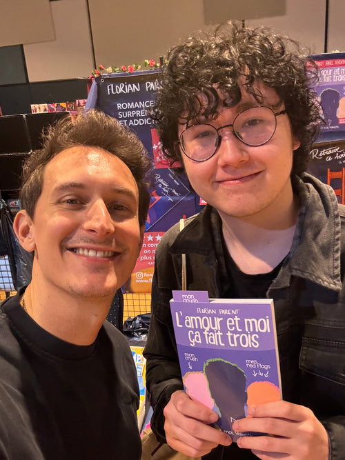 Florian Parent avec un lecteur en dédicace
